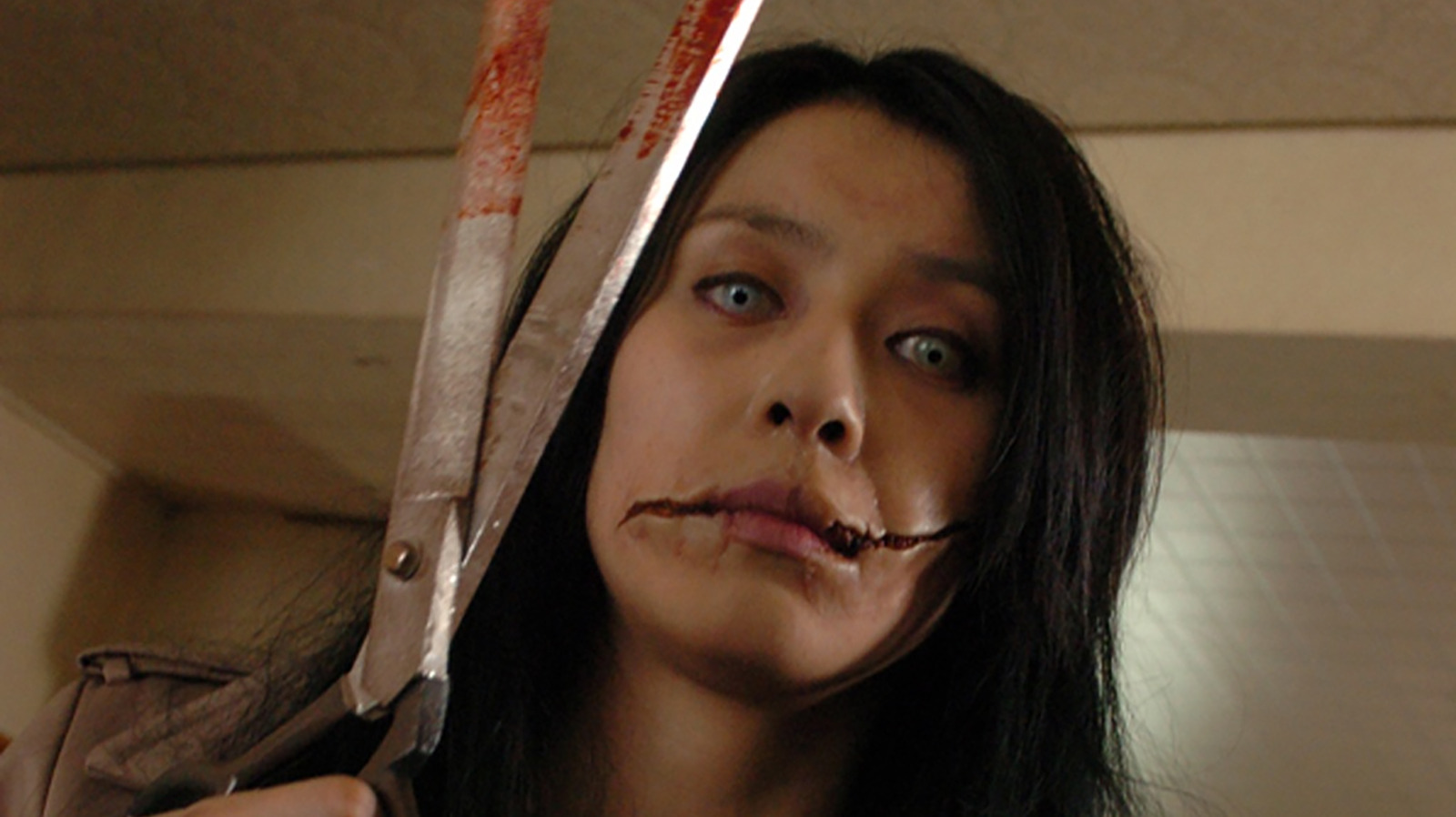 Featured image for Carved: The Slit-Mouthed Woman (2007) by Koji Shiraishi